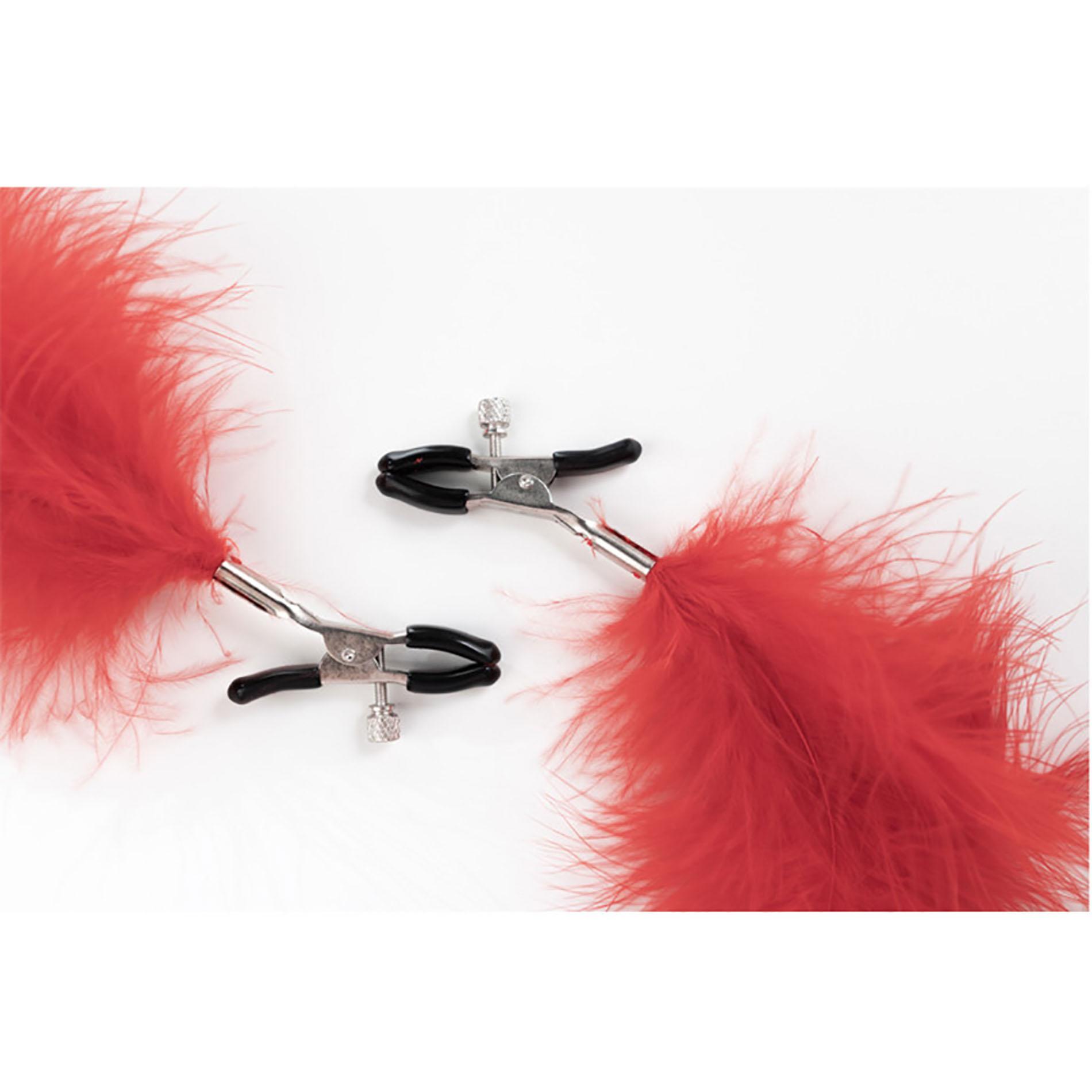Feather nipple clamps with adjustable pressure, red